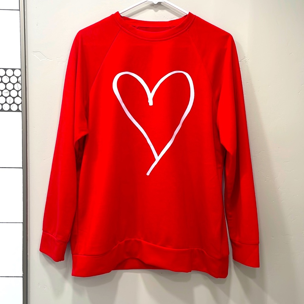 Cute juicy red sweater with white heart